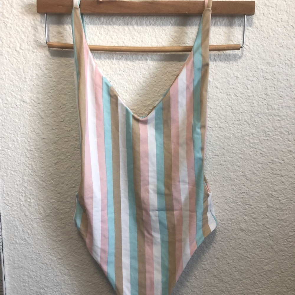 Adorable one piece, maybe worn once! Given to me as a gift but too small!